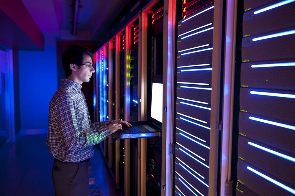 An engineer at the racks